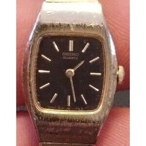 SEIKO WOMEN'S 2C20-5559 QUARTZ WATCH GOLD TONE BAND BLACK DIAL,CASE IS GOLD TONE